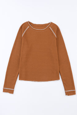 High textured brown with long sleeves and round neck *