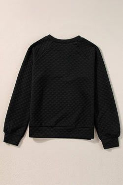 Black quilted top with long sleeves and split collar