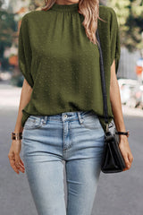 Blouse vert brume à pois suisses, col montant, manches chauve-souris-A WOMAN WE LOVE