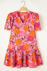 Mini-robe fleurie rose à manches bouffantes *