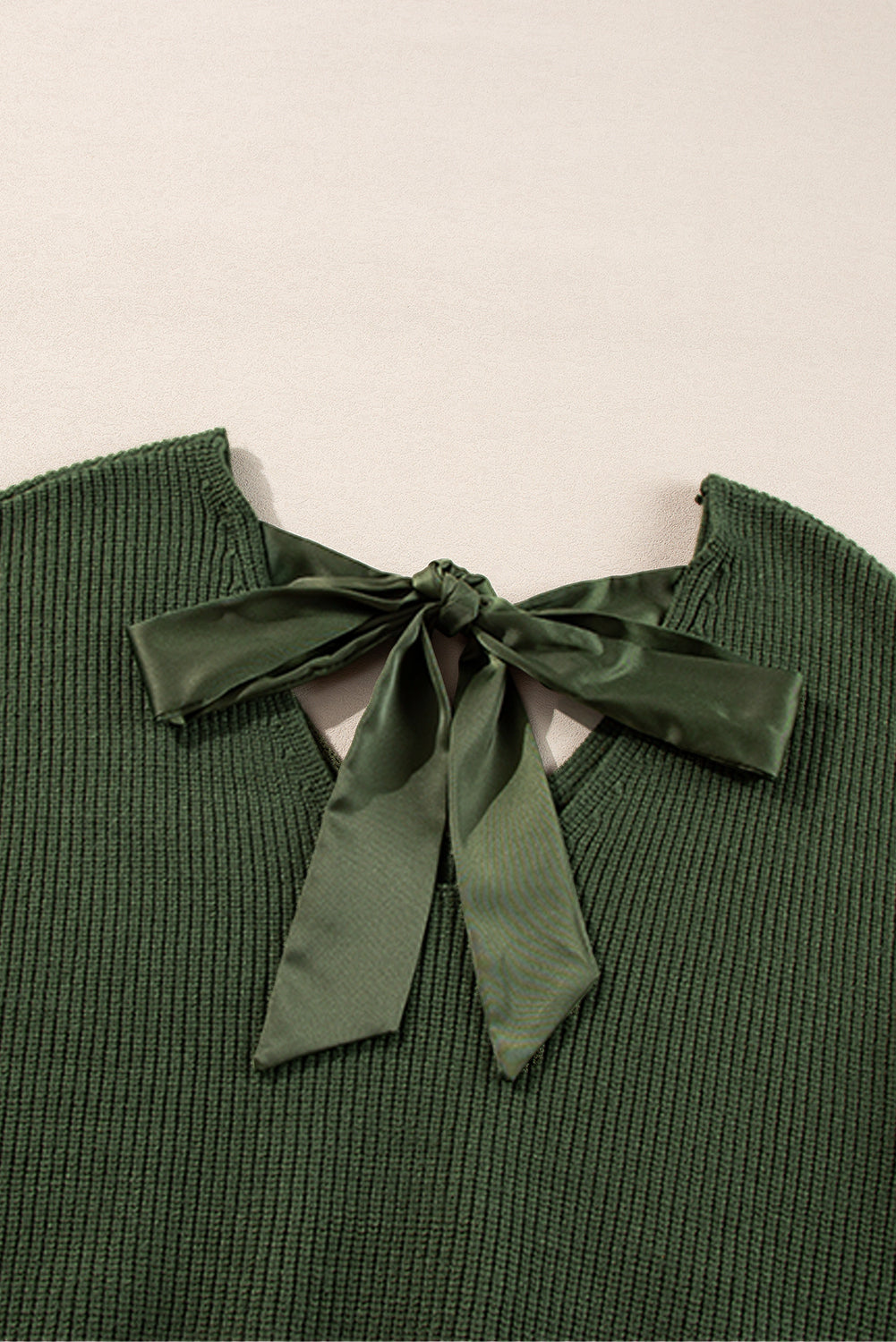 Jungle green sweater with lantern sleeves, V-neck, knot at the back