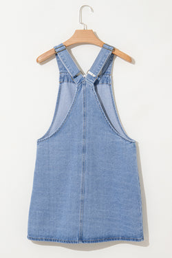 Short denim dress with wide suspenders *