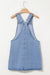 Short denim dress with wide suspenders *