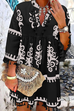 Black V -neck dress with fringes and large Western floral print