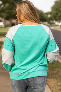 Sweat-shirt Aruba Blue Colorblock Patchwork avec coutures croisées