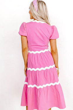 Mid-length fluid dress with short puffing sleeves and candy ric rac border