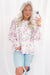 Babydoll pink blouse with floral print and frozen balloon sleeves with lock hole on the back