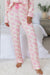 Pink pajama set with long sleeves and flower pants