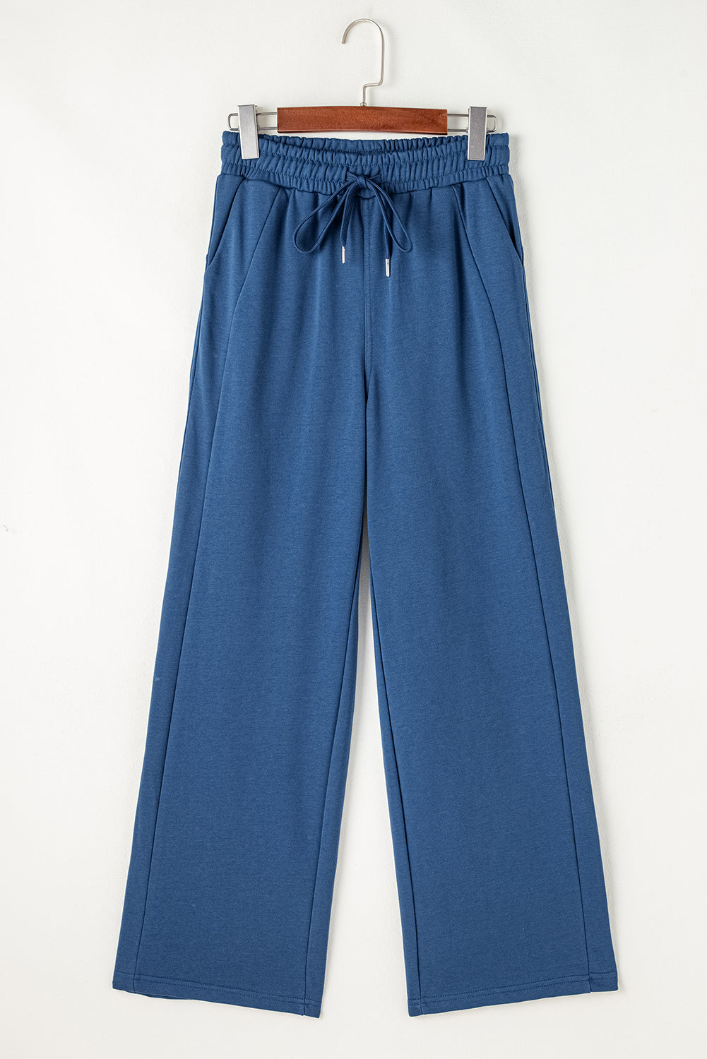 High waist tracksuit with tightening cord and wide blue sail pockets