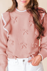 Pull à manches longues et bordure côtelée avec nœud papillon et volants rose clair