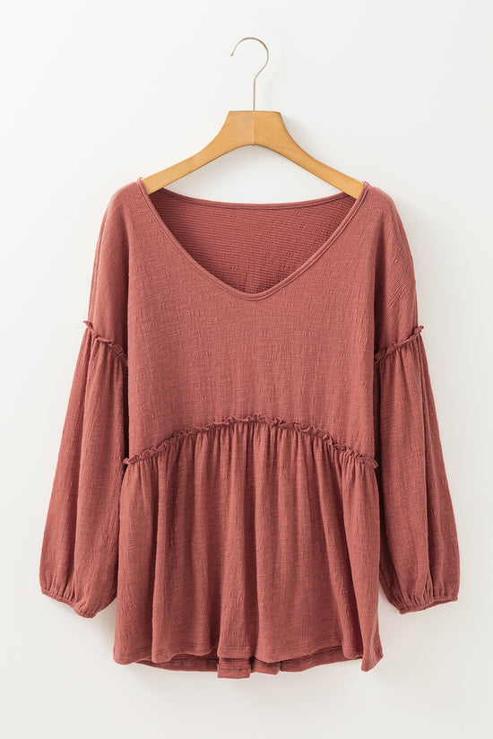 Puffy sleeve blouse and V -collar with tuffled ruffled in a solid mineral red colored