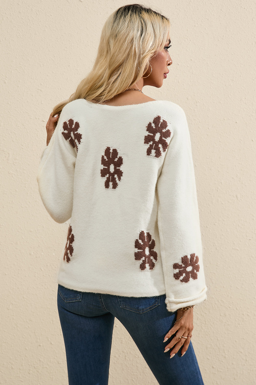 White round-neck sweater with color block floral pattern