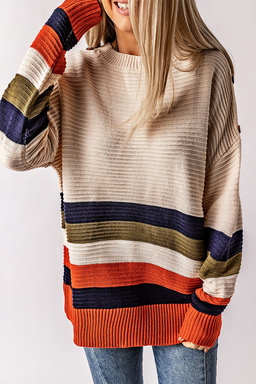 White striped sweater with dropped shoulders and buttoned shoulders
