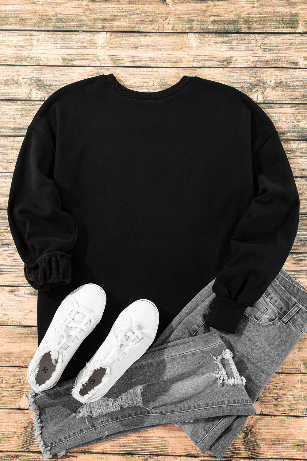 Sudadera negra unida con hombros caídos y forro de vellón