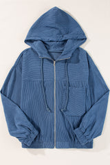 Veste bleu sarcelle en velours côtelé à capuche et fermeture zippée
