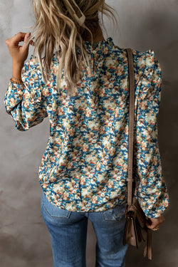 Blusa azul cielo con mangas hinchadas *