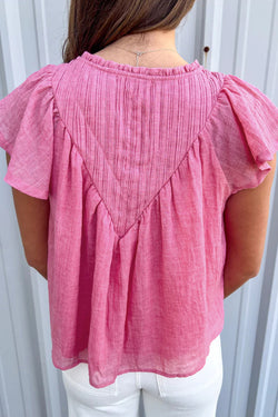 Blouse in floating gauze textured pink lively pink with split collar and patchwork