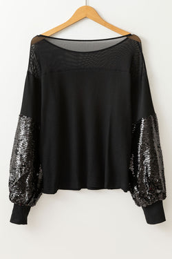 Black blouse with lantern sleeves and sequins patchwork