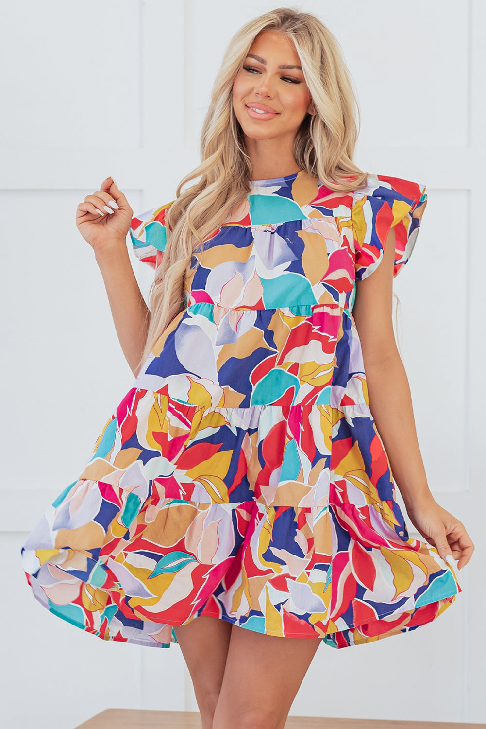 Mini-ruffle and floating sleeves *