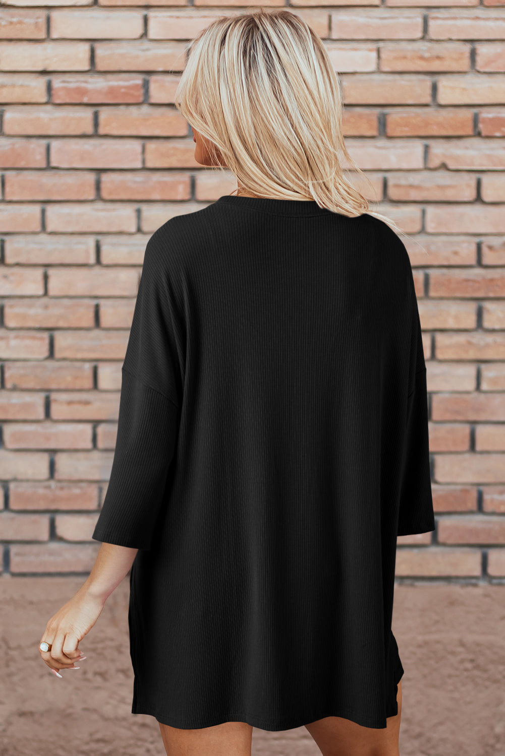 Loose tunic and slim shorts set in black, solid color