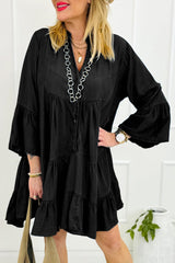 Black mini-Robe in ruffled chambray and 3/4 sleeves on several levels and split v-neck