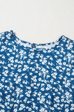 Blue blouse with small flowers and lantern sleeves