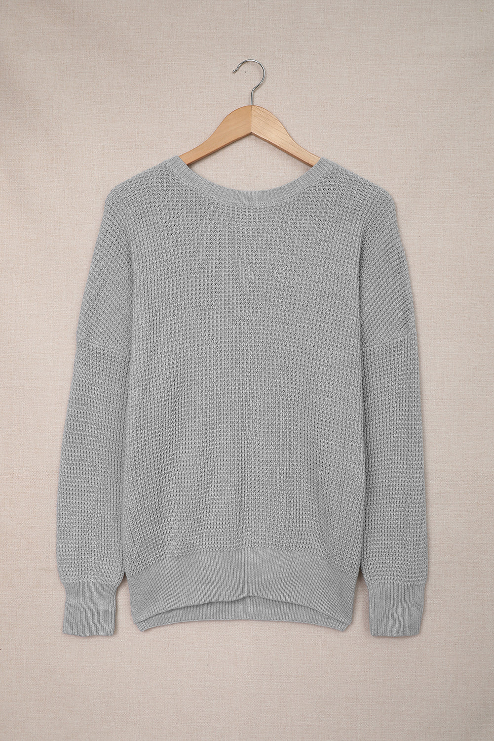 Gray haked sweater in the cross -back