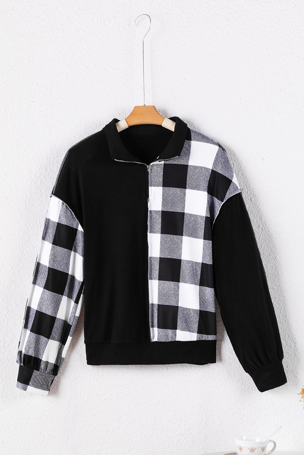Black checkerboard patchwork collared top with exposed seams