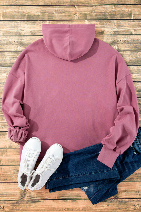 Loose hoodie with kangaroo pockets and half-zip lined with valerian fleece