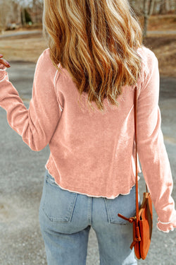 Long -sleeved textured high and apricot pink round pink neck *