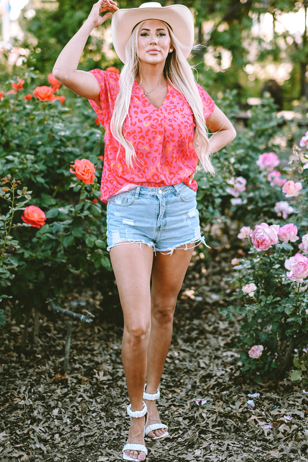 Blouse léopard rose à manches courtes et col en V