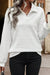 White long sleeve top with sporty collar and quilted texture