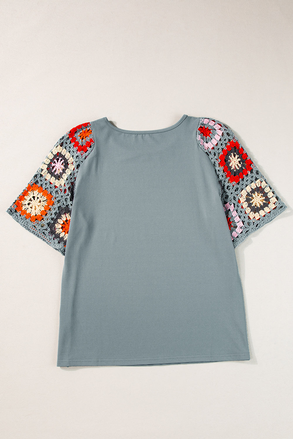 High -hook -in -handed -sleeved top *