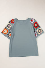 High -hook -in -handed -sleeved top *