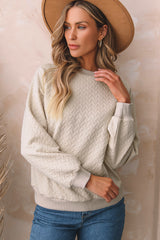 Sudadera beige texturizada une con manga raglán