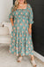 Smocked long dress with floral print and large green square collar