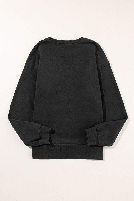 Black sweatshirt with snap buttons and side slits