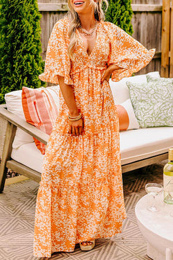 Robe longue smockée à imprimé floral orange*