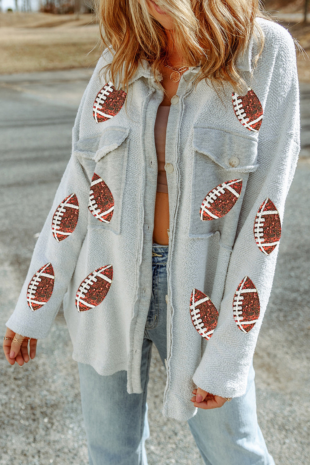 Veste boutonnée grise à paillettes avec poches à rabat et rugby