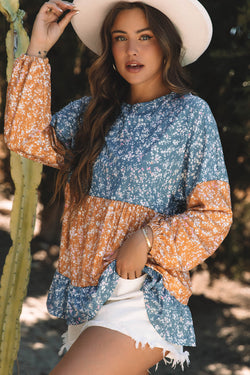 Blusa naranja con flores y bloques de color *