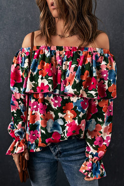 Flying blouse and bare shoulders with floral print