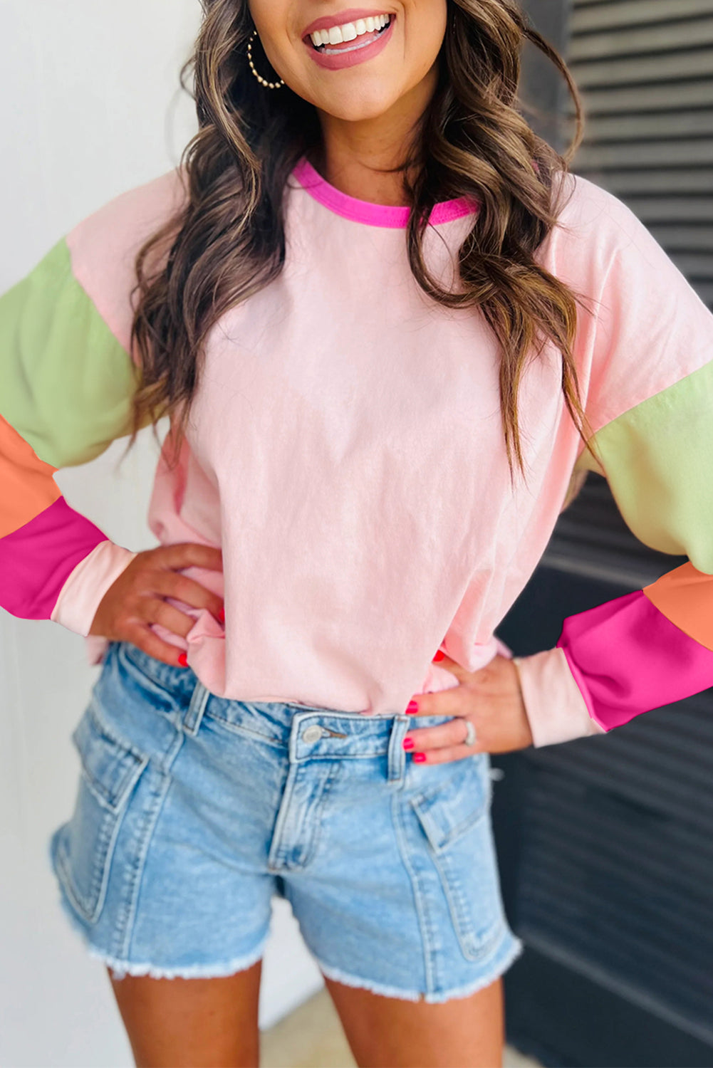 Top sciolto a manica lunga colorblock rosa