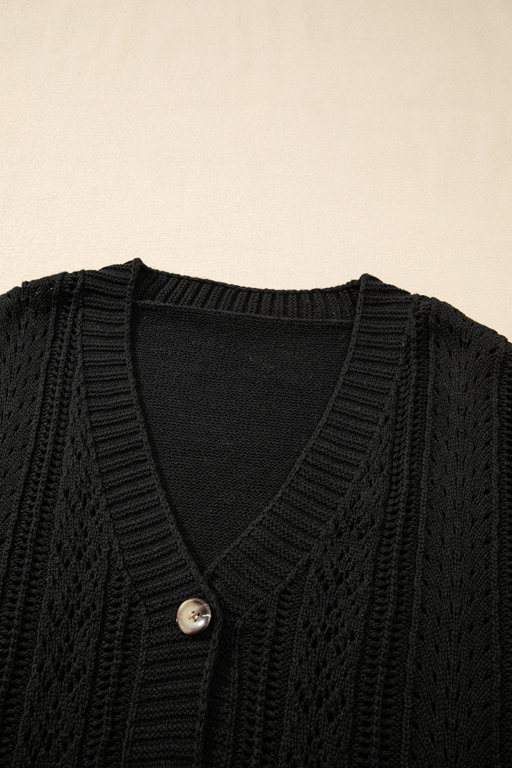 Cardigan pull noir à épaules tombantes en tricot ouvert