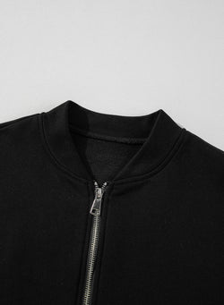 Ensemble veste zippée noire à coutures unies et pantalon à taille avec cordon de serrage