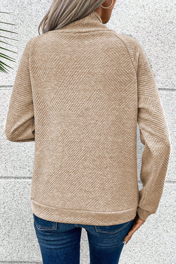 Apricot textured mock neck sweatshirt with asymmetrical buttons