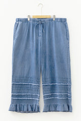 Pantalon large en jean bleu grande taille à volants et bords bruts