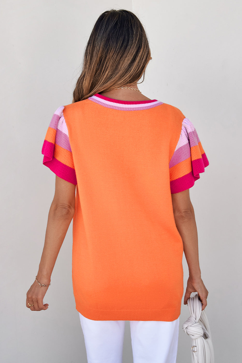 Maniche a flutter a contrasto di carota maglia maglione a maglia