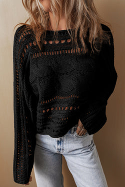 Short black sweater in Twisted Twisted mesh