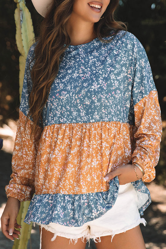 Blusa naranja con flores y bloques de color *