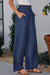 High-waisted wide-leg jeans with ruffles and side pockets in sail blue